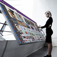 Screenshot of ATOMIZED Social Streams on a Touchscreen Monitor