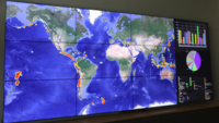 Screenshot of a Collage of Data Visualizations and Maps on Video Walls with Lygos